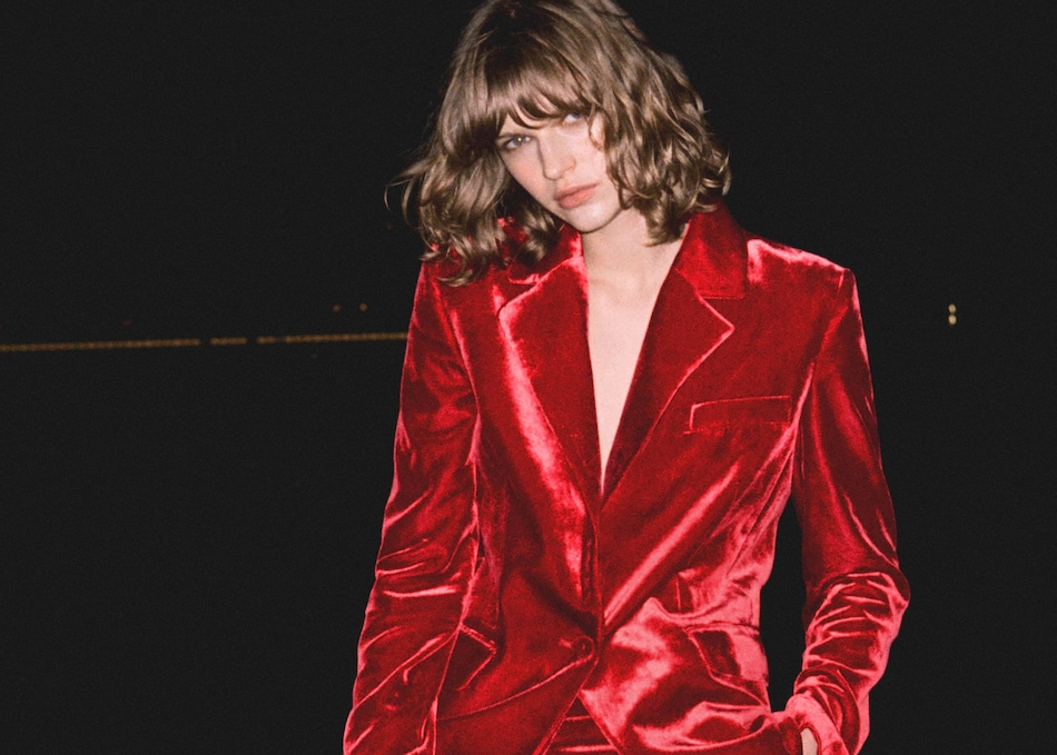 A Thanksgiving outfit for women with a red blazer.