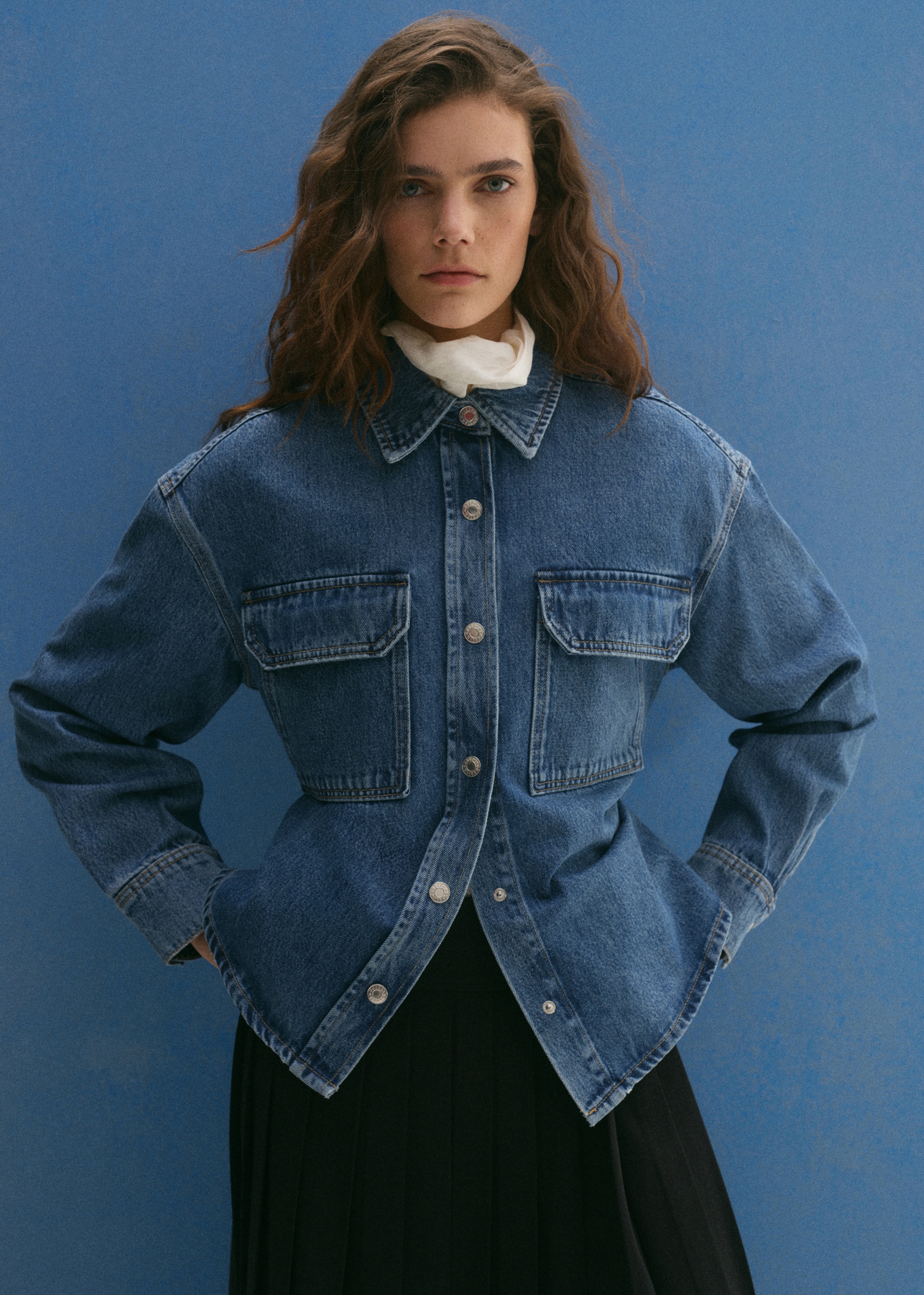 Women's cowboy look with denim shirt.