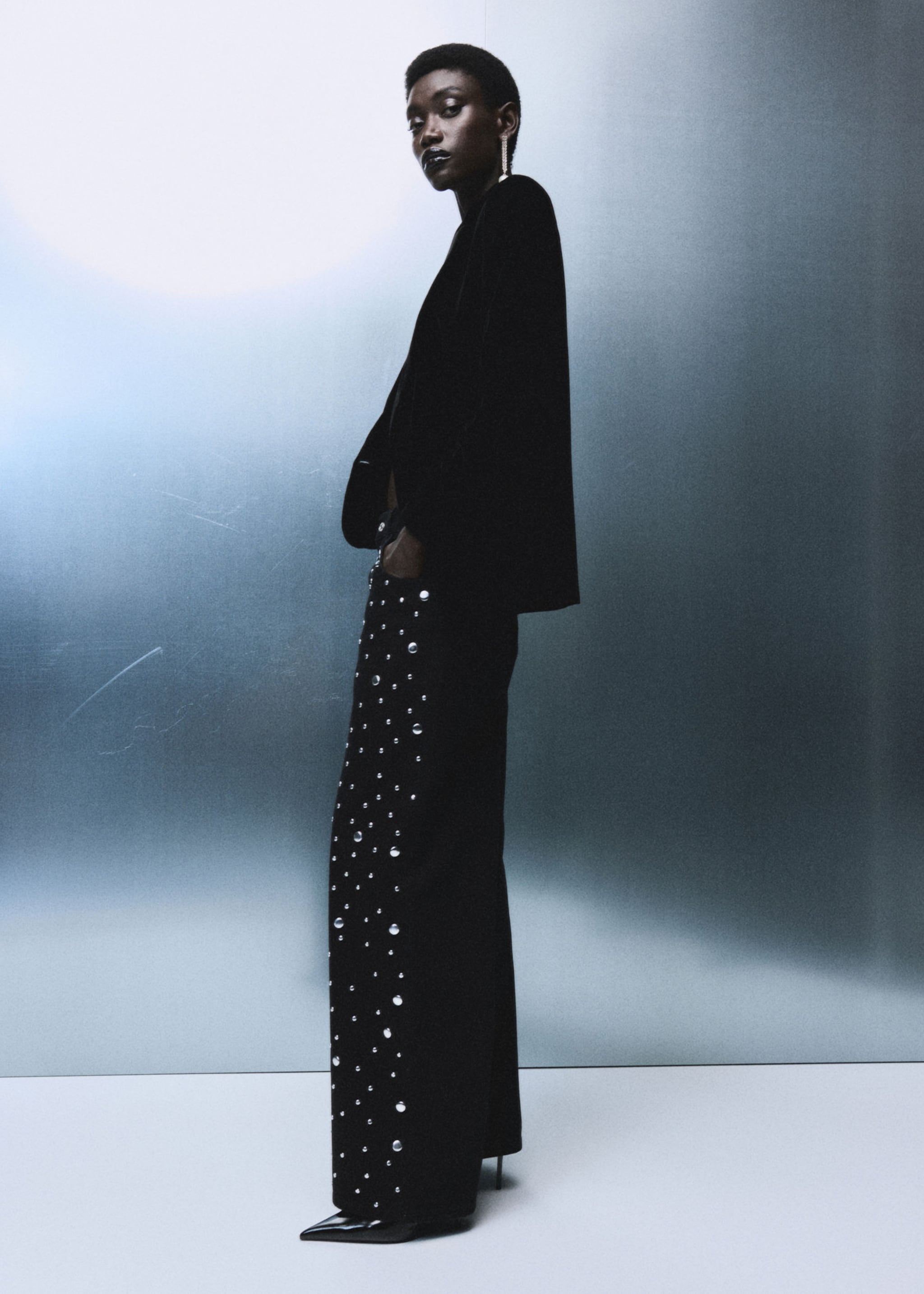 Woman wearing a dress for a company Christmas dinner.