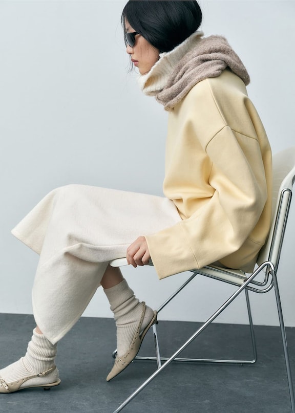 Woman wearing a woman's casual outfit.