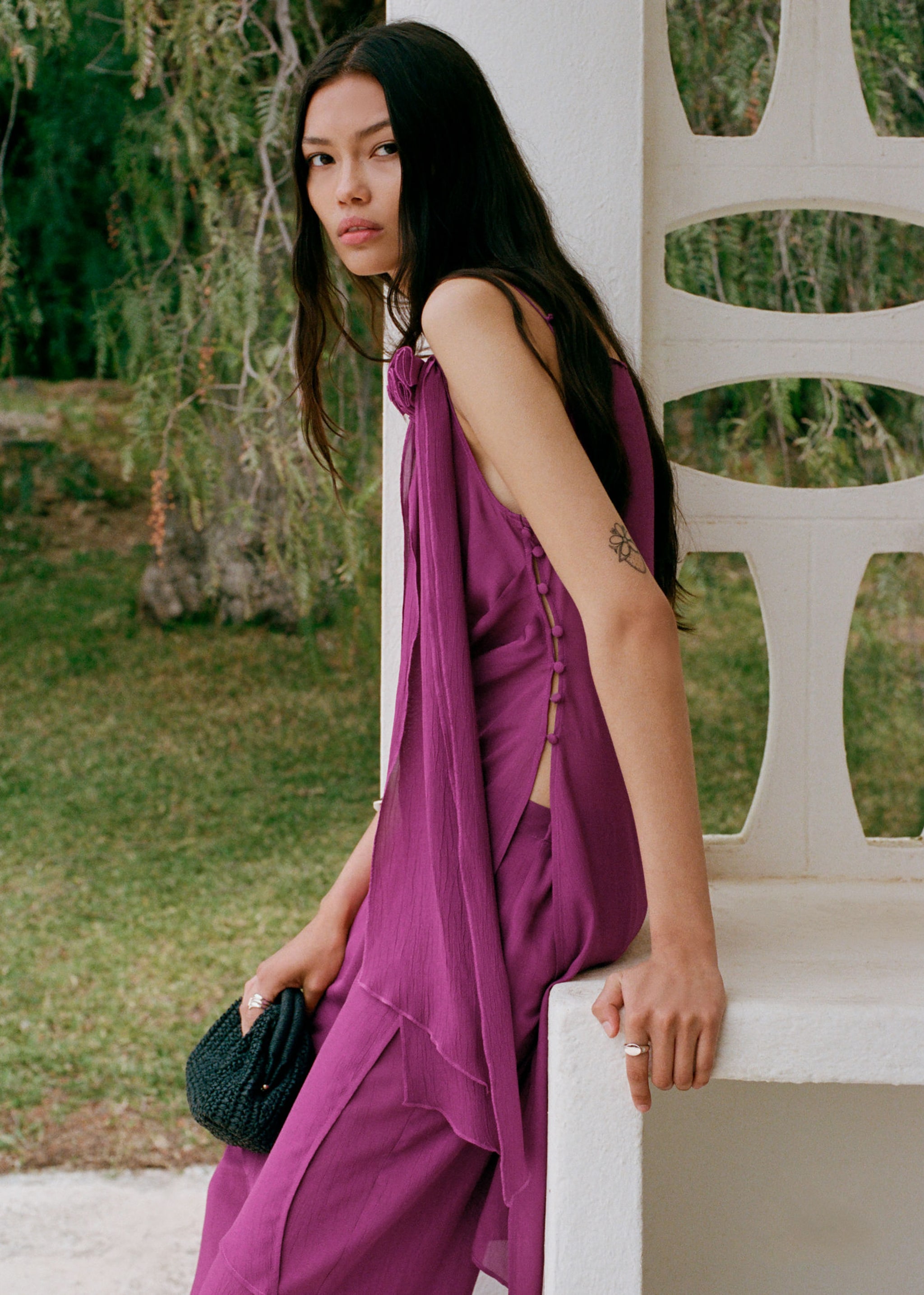 Two-piece wedding guest outfit.